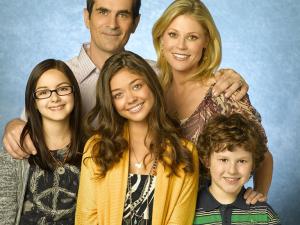 Modern Family: Phil and Claire Dunphy (back row) Alex, Haley and Luke Dunphy (front row)
